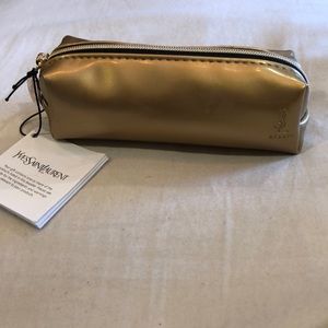 Yves Saint Laurent mini gold make up bag